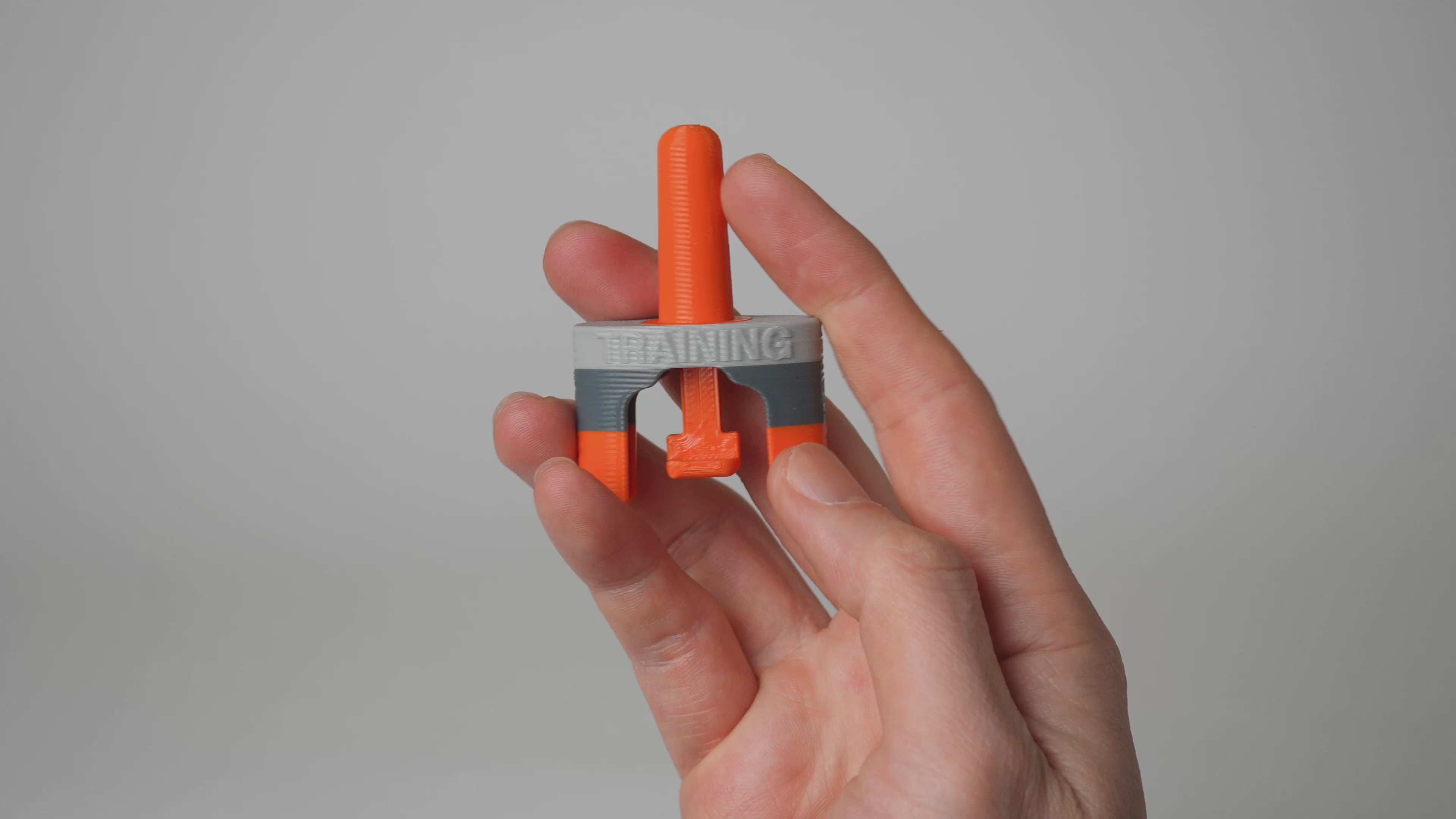 Load video: Video demo of SnapTrainer showing break-away resistance and easy resettability.